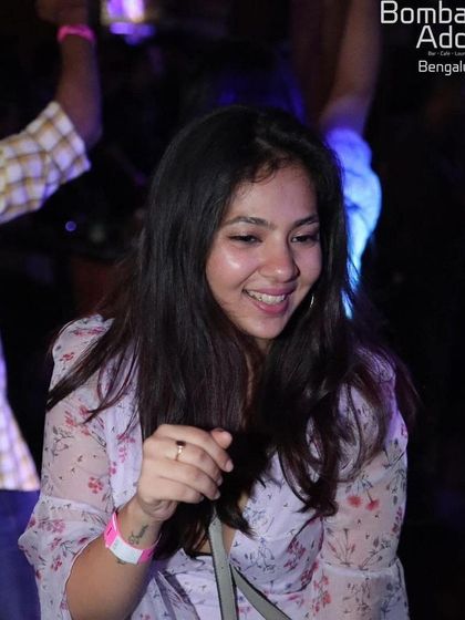 A smiling face in the crowd at Bombay Adda. The mid-week parties are just as energetic as the weekends.