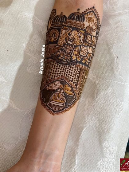 Another armband detail, this time showing the sacred Gathbandhan knot and the holy fire, key elements of the wedding ceremony.