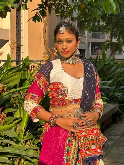 A close-up of the Gangubai look, focusing on the layered jewelry and the determined expression. This outfit is for the bold and confident.