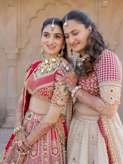 A heartwarming moment between sisters. This shot shows how my makeup looks beautiful both in portraits and in candid, emotional moments.