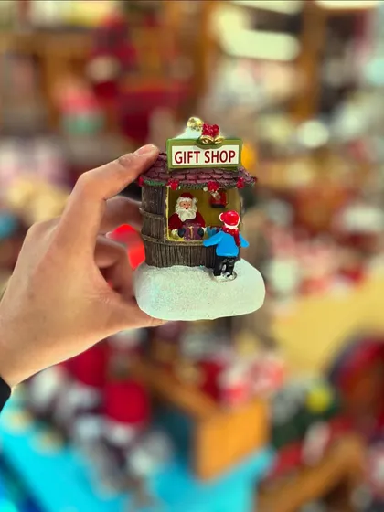 Looking for Christmas gifts? I’ve got the cutest little stuff for everyone on your list, like this tiny Santa's gift shop ornament.