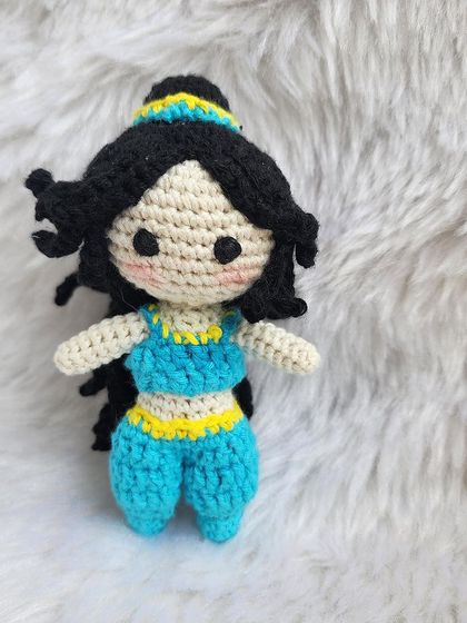 Princess Jasmine from Aladdin. I loved creating her iconic blue outfit and hairstyle. She is ready for a magic carpet ride and makes a wonderful addition to the Disney princess collection.