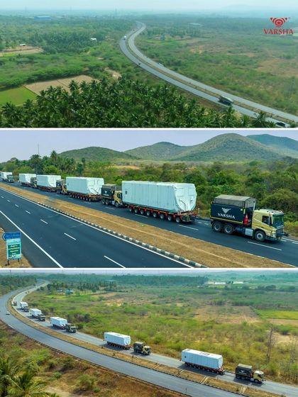 An aerial perspective of a Varsha Logistics convoy navigating the highway in Madurai. These wide shots are perfect for showcasing the scale and reach of a logistics company's operations.