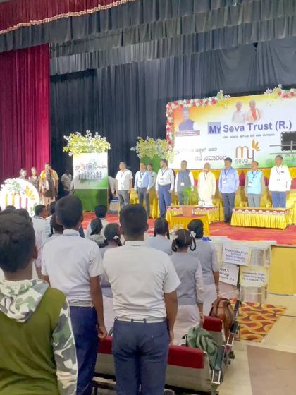 The students stand in unison, a powerful image of the disciplined and hopeful youth of our nation.