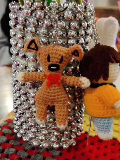 A mini version of Mr. Bean's teddy, perfect for adding a touch of nostalgia to your keys.