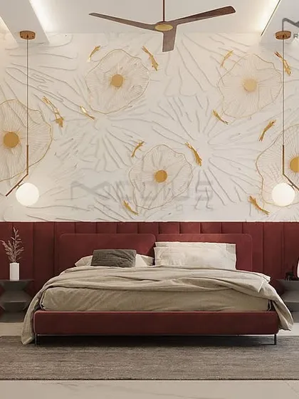 This design concept for a master bedroom showcases our visualization process. The plan features a bold, deep-red upholstered headboard and bed frame, set against a delicate, custom-designed floral wall relief. Modern pendant lights add a touch of sculptural elegance, illustrating how we balance color, texture, and form.