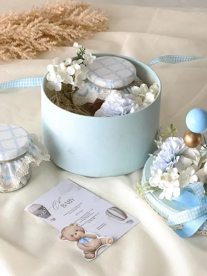 Celebrate with love and leave a lasting impression with our beautifully curated baby shower hampers, filled with jars of brownies and flavored almonds.