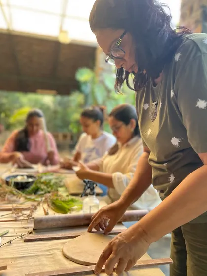 A group of women finding their focus during a guided session at the retreat. The natural surroundings provide the perfect inspiration.
