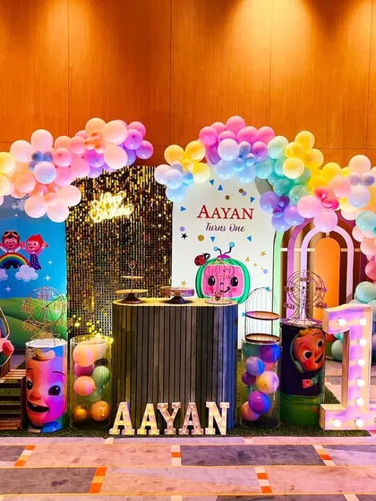 For the little ones who love Cocomelon, I create a world of color and fun. This full stage setup features all the favorite characters, a rainbow balloon arch, and a custom-lit name sign to make the birthday child feel extra special.