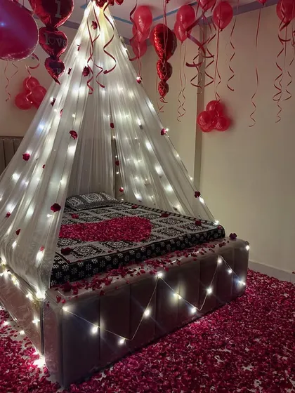 A close-up of the fairy light canopy, which creates a warm and dreamy glow in the room.