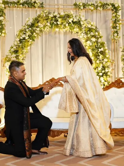 A magical moment from my engagement. I styled both our outfits to complement each other and the elegant floral decor. For your special events, I help coordinate looks for couples and families, ensuring everyone looks picture-perfect and harmonious.