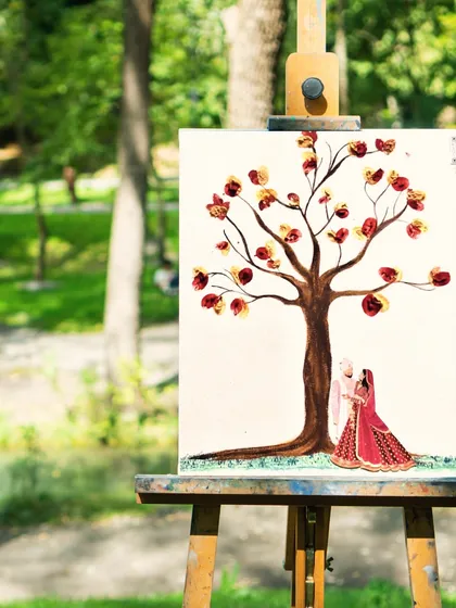 Forget boring guestbooks. I designed this thumbprint tree on canvas, where guests add their thumbprints as leaves. It’s an interactive piece of art that you can actually hang in your home.