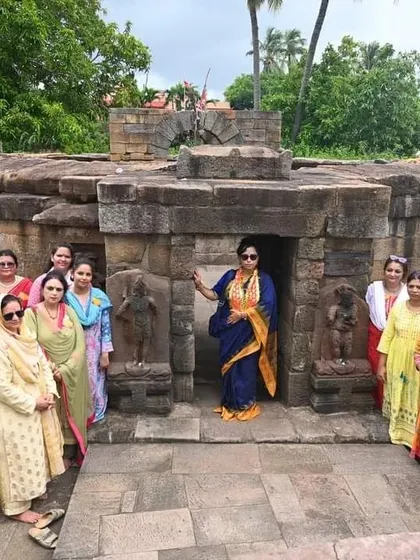 A group of women exploring the 64 Yogini Temple.