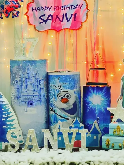 A close-up of the detailed props and decor for Sanvi's Frozen-themed birthday party.