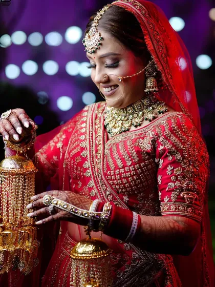 A beautiful shot of the bride looking down at her 'kalire', full of tradition and grace.