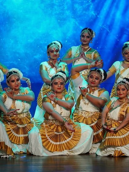A beautiful group formation by our Mohiniyattam dancers. Their synchronized poses and serene expressions reflect the gentle, lyrical quality of this classical dance.