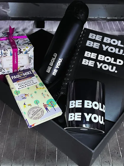 We offer variations to fit different needs and budgets. This version of the Alt F gift set includes a branded sipper, notebook, mug, a gourmet chocolate bar, and one of our Miara soy wax candles.