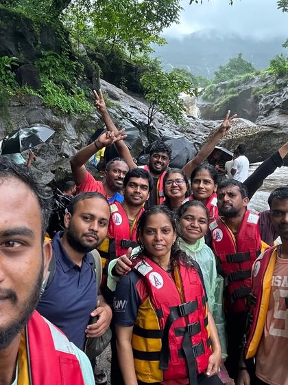 It's a wrap! A group selfie with everyone wearing life jackets after a thrilling water activity.