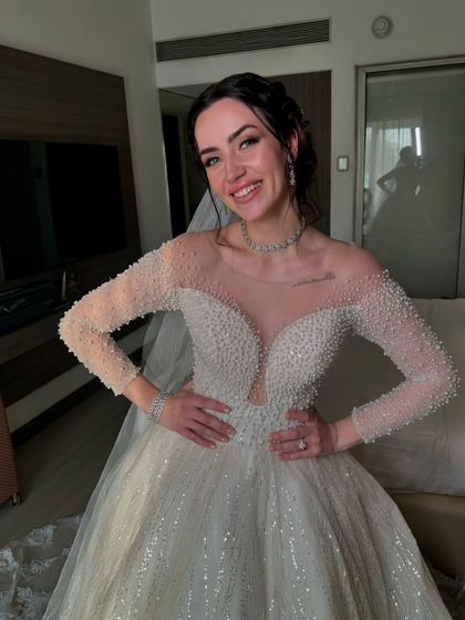 Elegance in white, glowing with love and grace. This Catholic bride looks absolutely radiant on her special day.