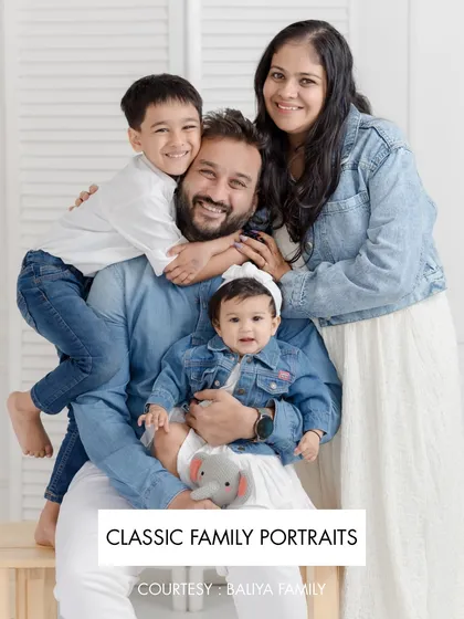 A classic family portrait is more than just a photo; it's a feeling. The pure, unscripted joy of the Baliya family, all dressed in classic denim and white, is a perfect example of the timeless memories we capture in the studio.