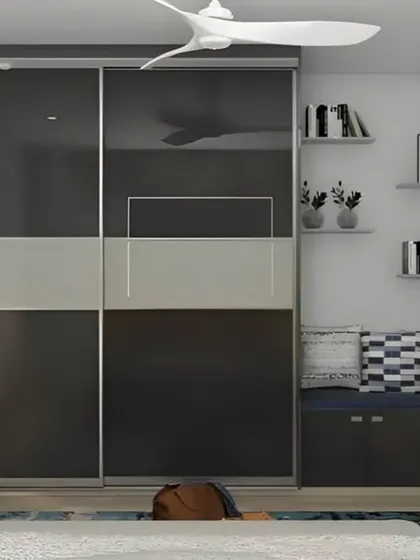This design showcases a sliding door wardrobe, which is ideal for tight spaces as it doesn't require room to swing open. We've also integrated a cozy seating nook with storage underneath.