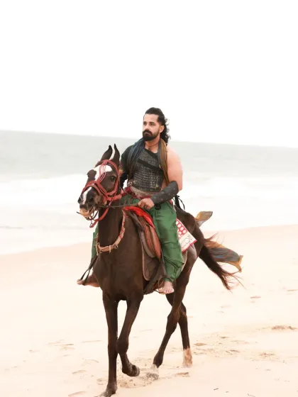 A male warrior concept shoot on the beach. Using the natural landscape and strong, directional light, I created a series of intense and heroic portraits of an actor, complete with a sword and styled costume.