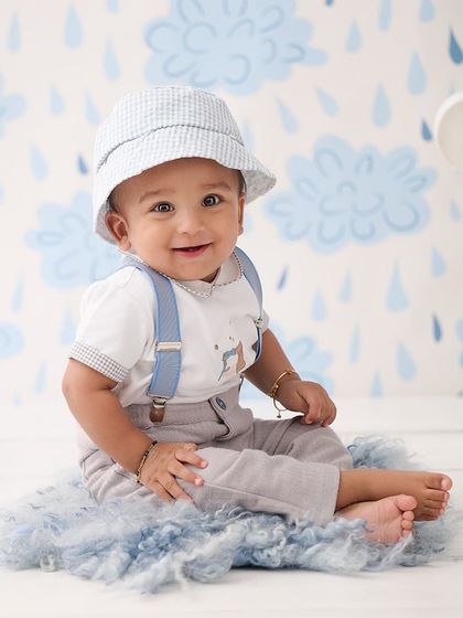 Another angle from our cloudy day session, capturing a sweet and happy smile. We always take a variety of shots to get the perfect portrait.