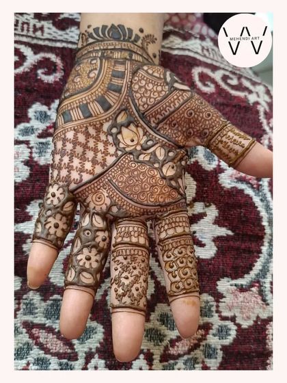 An intricate design with a mix of floral and geometric patterns.