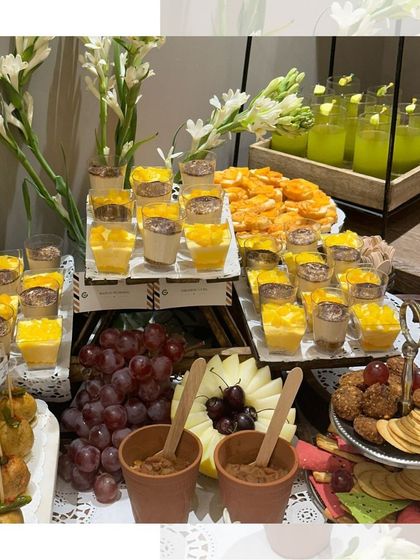 Little bites that make a big impression. This spread includes dessert shots, fruit skewers, and other mini appetizers, perfect for guests to enjoy while socializing.