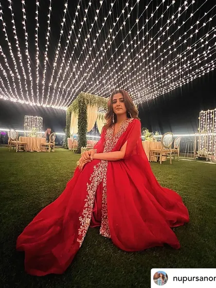 The full view of the elegant terrace setup, with comfortable seating under a sky of twinkling lights, creating the perfect ambiance for a festive gathering.