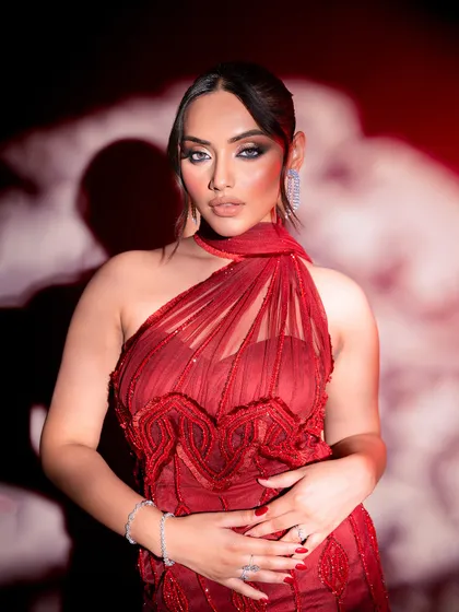 A portrait from a glamorous evening wear shoot, with a focus on the diamond waterfall earrings. I styled the model in a dramatic red gown, with her hair pulled back to ensure the sparkling jewelry captured all the light and attention.