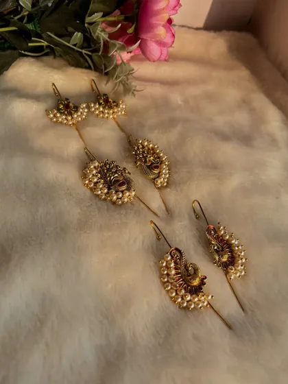 A collection of some of my smaller ear cuff designs, showing the variety available for rent.