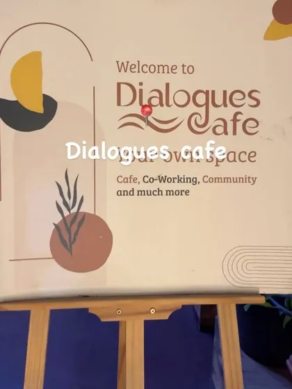 Welcome to Dialogues Cafe: a place for coffee, co-working, community, and so much more. This sign at our entrance captures the essence of what I aim to provide.