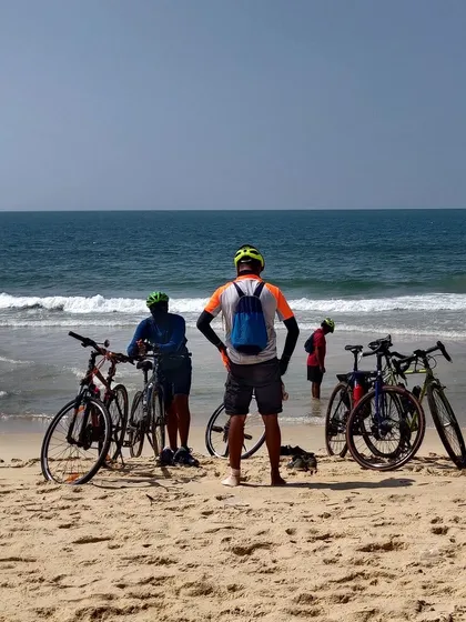 Taking a break on the beach to admire the Arabian Sea. Our coastal tours are paced to let you soak in the sun, sand, and sea.