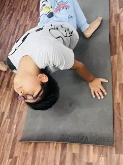 After an active class, we end with Savasana, the relaxation pose. This teaches children how to rest their bodies and quiet their minds.