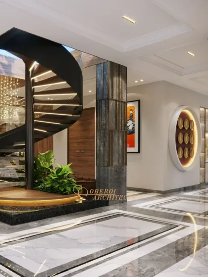This central atrium makes a powerful first impression with its sculptural spiral staircase. The design uses an interplay of marble, wood, and reflective surfaces to transform a simple passageway into a memorable architectural experience.