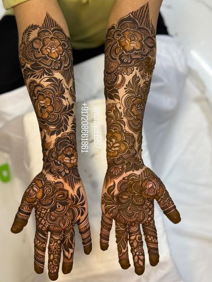 This floral design is packed with detail, using different shading techniques to give the flowers depth and dimension.