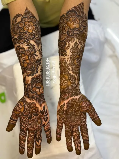 This floral design is packed with detail, using different shading techniques to give the flowers depth and dimension.