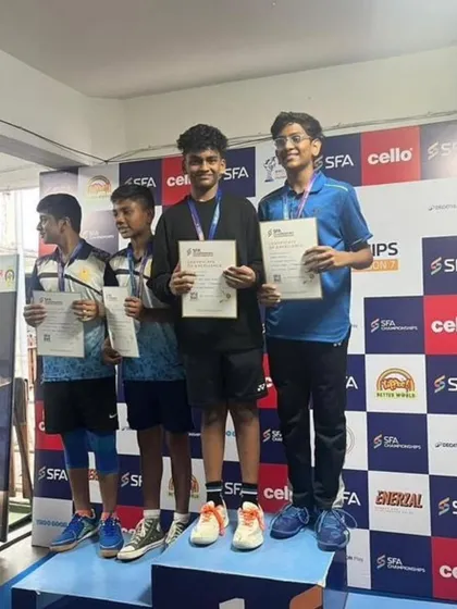 The doubles winners celebrate their victory at the SFA Championship. Our experience covers various formats, including singles, doubles, and team events for all age categories.