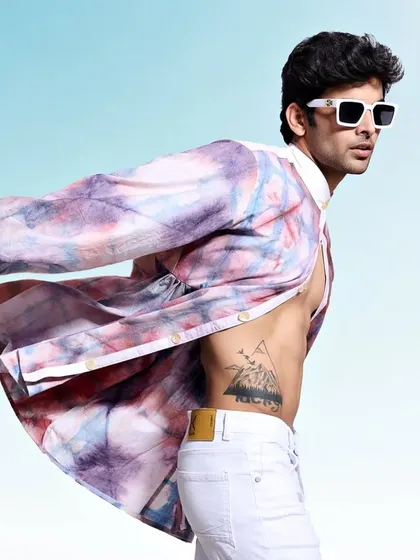 Another angle from the same series, showing the unique pattern of the shirt from the side. This helps customers visualize the garment from all perspectives in an e-commerce setting.