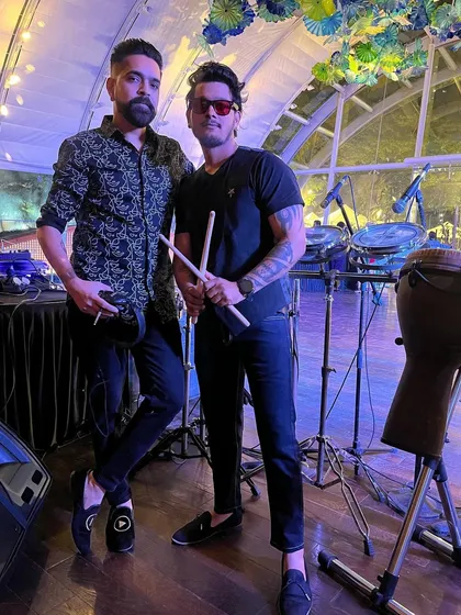 Posing with my friend and percussionist before a pre-Diwali gig. The combination of a DJ and a live drummer creates an infectious rhythm that is impossible not to dance to.