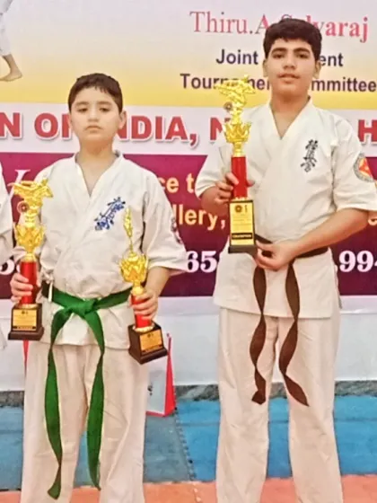 Another shot of the proud winners. Notice the different belt colors; students at various levels competed and won.