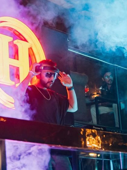 A recipe for a fire Saturday. Me at Hoot Cafe, surrounded by smoke and lights, ready to perform.