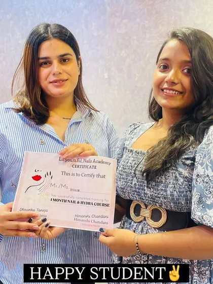 Seeing my students succeed is the best part of my job. Here is a happy student proudly holding her certificate after successfully completing the 1-Month Nail & Hydra Course, ready to start her own professional journey.