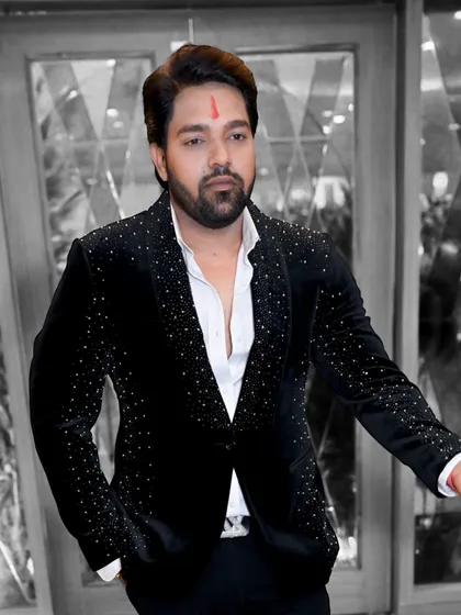 A client looking dapper in our black velvet blazer with scattered crystal work. The monochrome effect gives it a very classy and sophisticated feel.