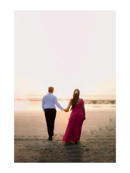 Walking hand-in-hand towards the sunset on an Alibaug beach. A simple yet powerful image that symbolizes the start of a new journey together.