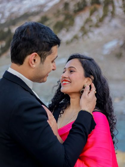 A tender close-up capturing the loving expression between the couple during their Manali photoshoot.