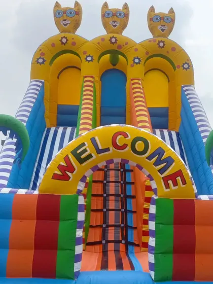 A close-up of the welcome arch on one of our colorful bouncy castles. The detailed stitching and bright colors show the quality of our work.