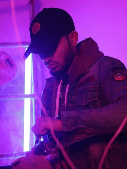 A candid moment in the zone. My focus is always on the music and the business. I bring this level of dedication to every artist's project that comes through So Savvy Studios.