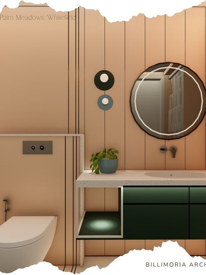 This powder room features soft peach-colored walls and a dark green vanity. The round backlit mirror and simple fixtures create a clean, contemporary look with a pleasant color contrast.